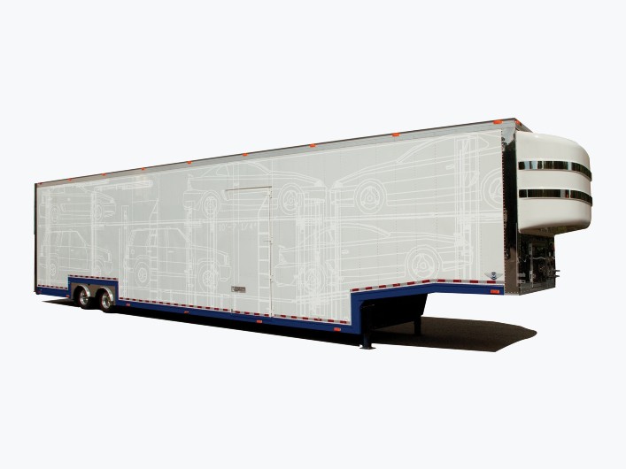 Enclosed vehicle shipping trailer